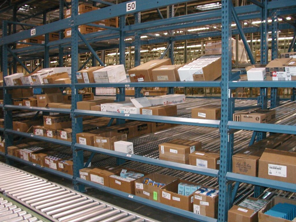 Carton Flow or Case Flow shelving mounted to teardrop posts