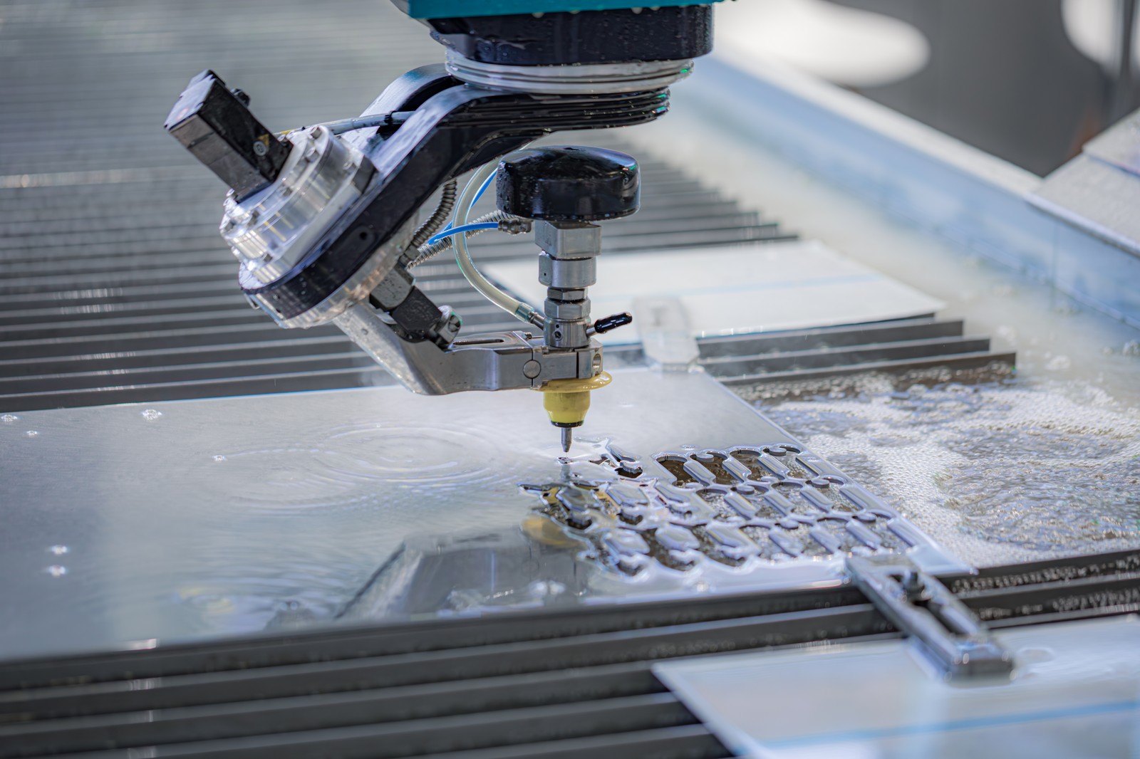 Sheet Metal Punching Vs. Waterjet Cutting For Industrial Parts